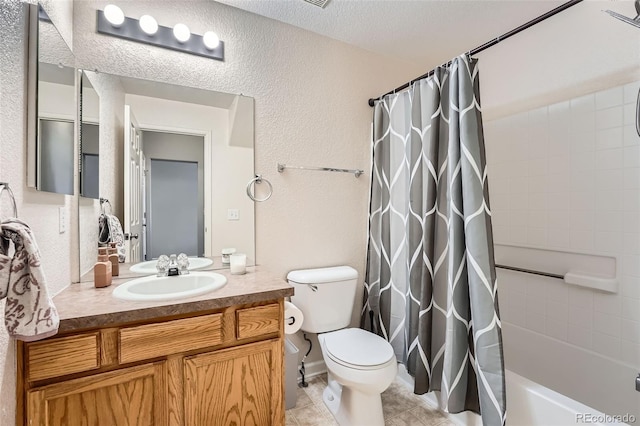 23882 E Alabama Dr, Aurora, CO 80018 - bathroom featuring toilet, vanity, shower / bath combo, tile patterned flooring, and a textured wall