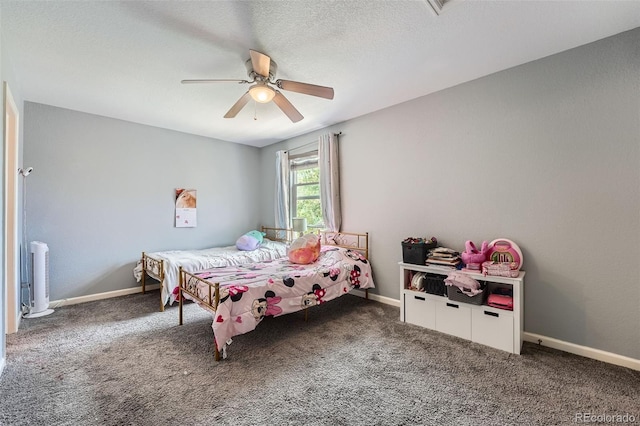 23882 E Alabama Dr, Aurora, CO 80018 - carpeted bedroom with a ceiling fan and baseboards