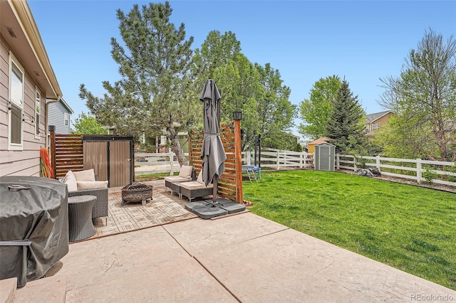 23882 E Alabama Dr, Aurora, CO 80018 - view of patio with an outdoor fire pit