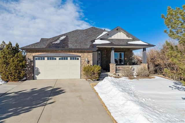 view of front of home with a garage and covered porch