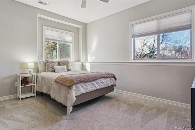 carpeted bedroom featuring ceiling fan