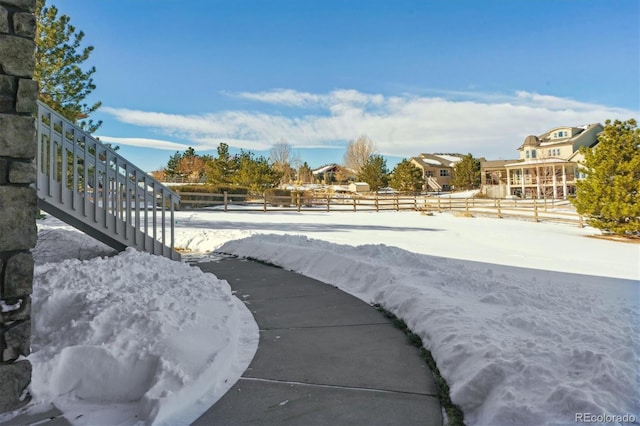 view of yard covered in snow