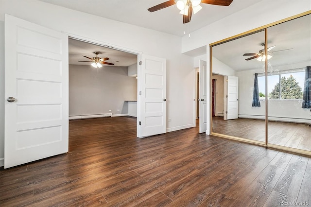 unfurnished living room with a ceiling fan, hardwood / wood-style floors, a baseboard heating unit, lofted ceiling, and baseboards