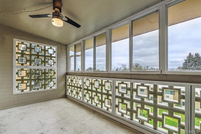 unfurnished sunroom with healthy amount of natural light