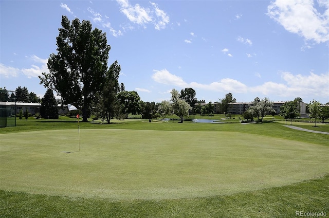 795 S Alton Way Unit 5D, Denver, CO 80247 - view of home's community featuring golf course view, an area to practice putting, and a yard