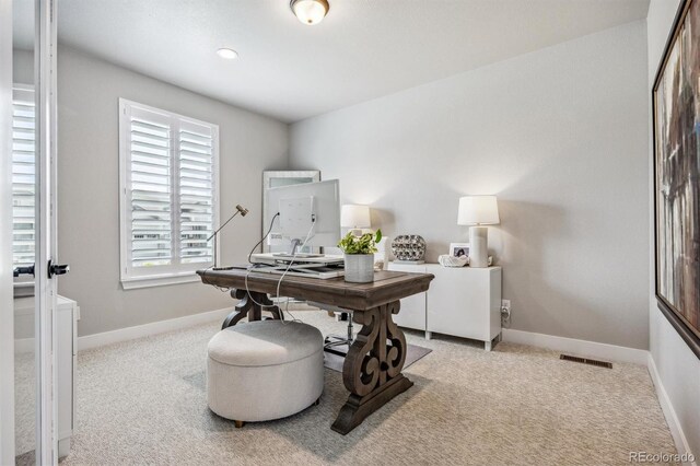 8890 S Quatar Ct, Aurora, CO 80016 - carpeted home office with baseboards