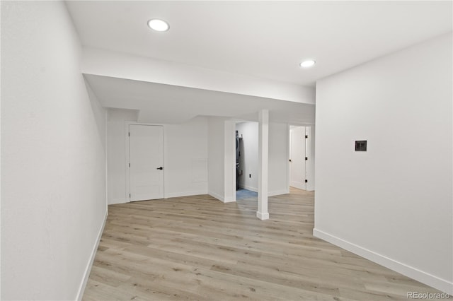 unfurnished room featuring light hardwood / wood-style floors