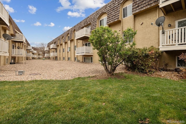 view of community with a residential view and a lawn