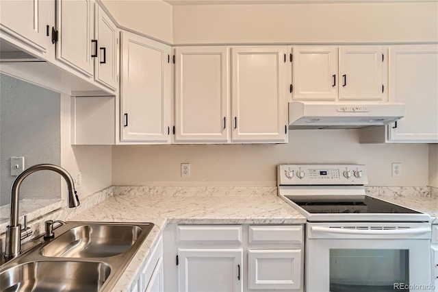 kitchen with electric stove, white cabinetry, sink, and light stone counters