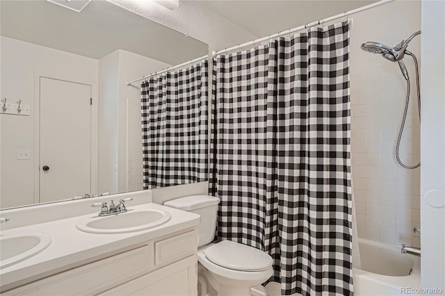 full bathroom featuring vanity, toilet, and shower / bath combo