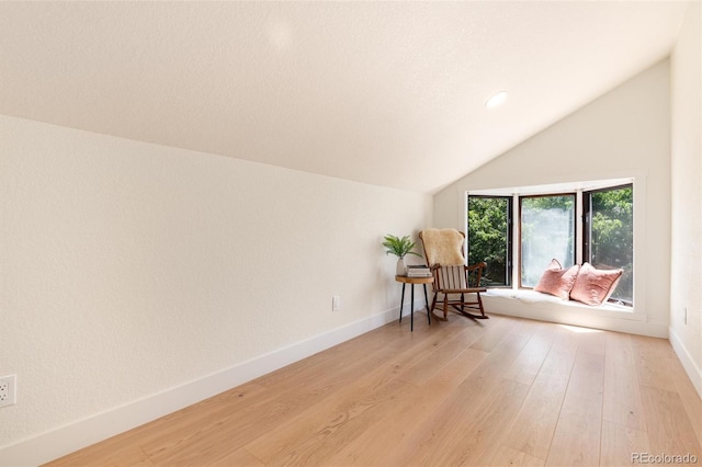 6097 S Jackson St, Centennial, CO 80121 - living area featuring light wood-style flooring, lofted ceiling, and recessed lighting