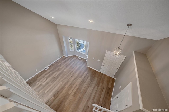 entrance foyer featuring hardwood / wood-style flooring