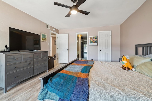6495 E Happy Canyon Rd Unit 163, Denver, CO 80237 - bedroom featuring light wood-style floors and a ceiling fan