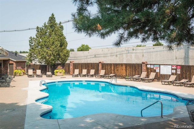 6495 E Happy Canyon Rd Unit 163, Denver, CO 80237 - community pool with a patio
