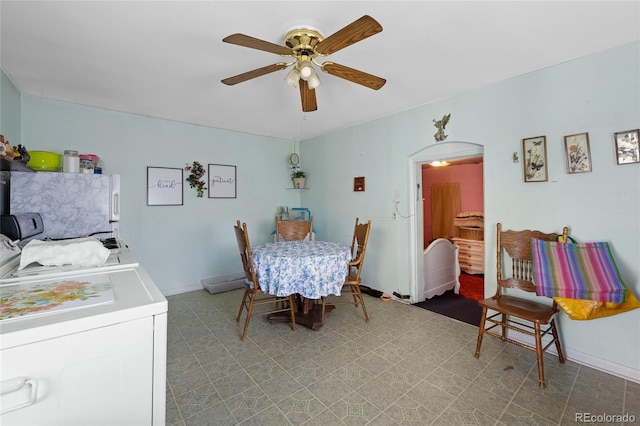 dining space with ceiling fan