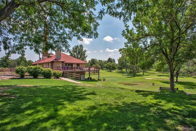 view of yard featuring a wooden deck