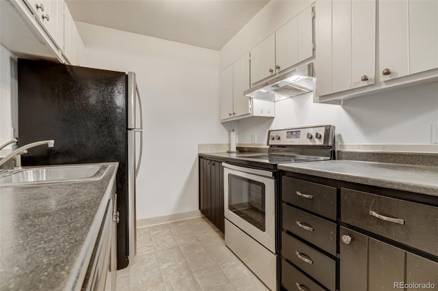 kitchen with sink, white cabinetry, and electric stove