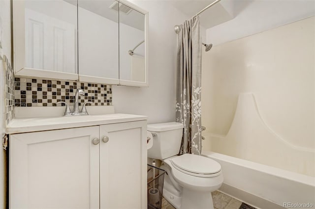 full bathroom with vanity, tile patterned flooring, toilet, tasteful backsplash, and shower / tub combo with curtain