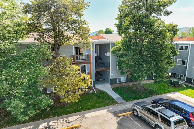 view of property with central air condition unit