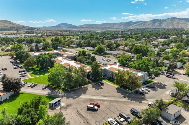 birds eye view of property featuring a mountain view