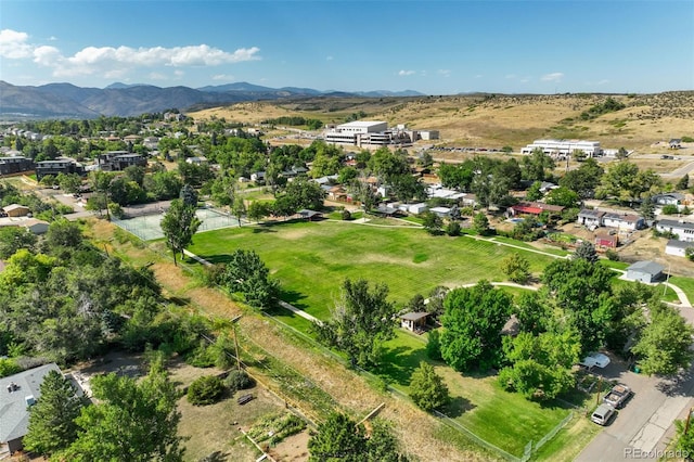 birds eye view of property featuring a mountain view