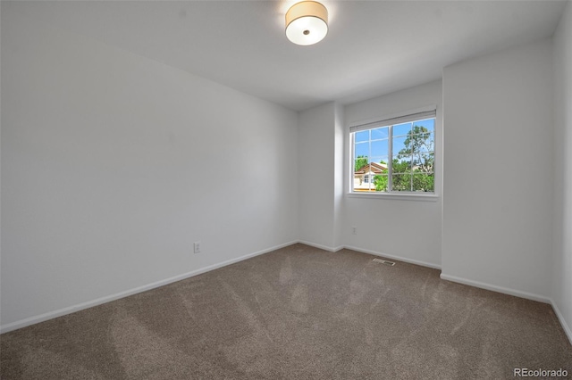8884 Miners St, Highlands Ranch, CO 80126 - carpeted spare room featuring baseboards