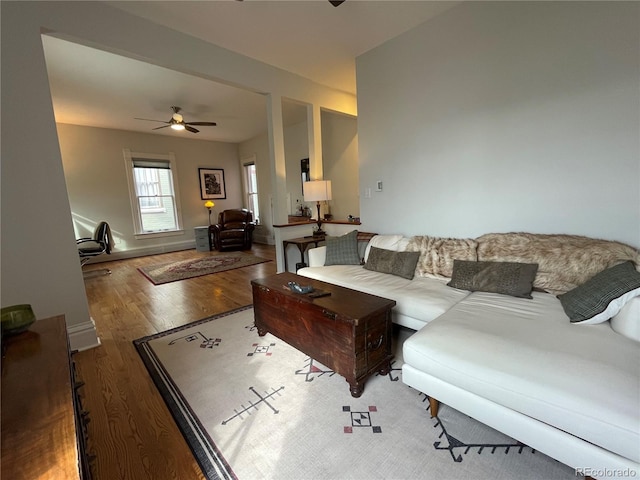 2335 Stout St, Denver, CO 80205 - living area featuring a ceiling fan and wood finished floors