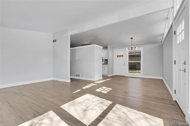 5373 S Prescott St, Littleton, CO 80120 - unfurnished living room with wood finished floors and baseboards