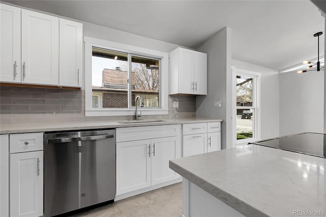 5373 S Prescott St, Littleton, CO 80120 - kitchen featuring dishwasher, a sink, tasteful backsplash, white cabinets, and decorative light fixtures