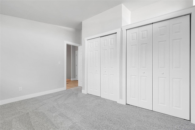 5373 S Prescott St, Littleton, CO 80120 - unfurnished bedroom featuring carpet floors, two closets, and baseboards