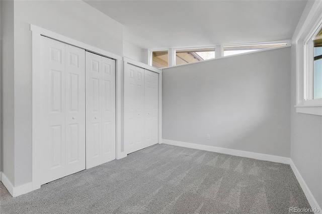 5373 S Prescott St, Littleton, CO 80120 - unfurnished bedroom featuring carpet floors, two closets, and baseboards