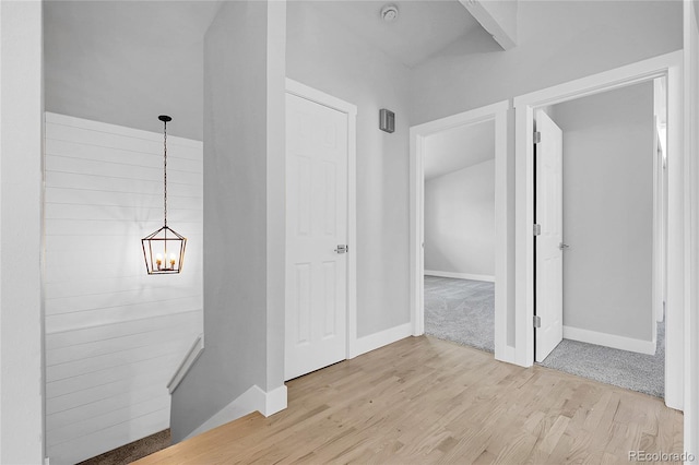 5373 S Prescott St, Littleton, CO 80120 - bathroom with a chandelier, baseboards, and wood finished floors