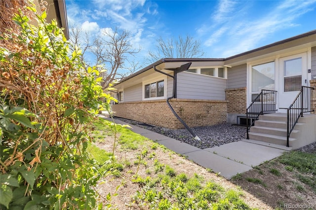 5373 S Prescott St, Littleton, CO 80120 - view of side of home featuring brick siding