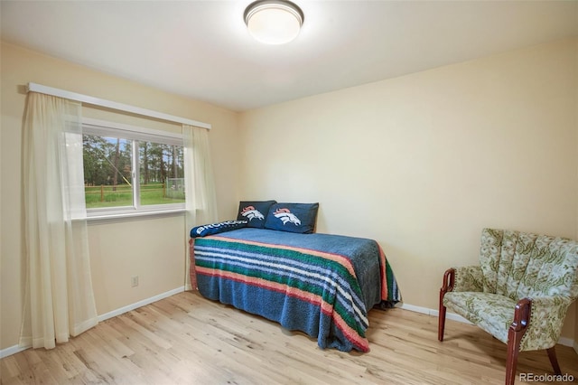 13365 Meadow Glen Ln, Colorado Springs, CO 80908 - bedroom with wood finished floors and baseboards