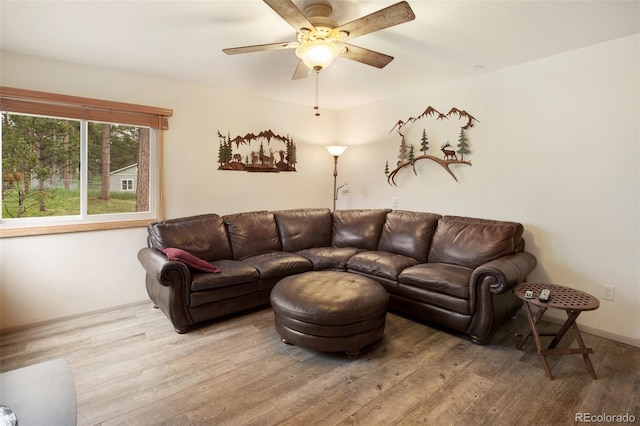 13365 Meadow Glen Ln, Colorado Springs, CO 80908 - living area featuring wood finished floors and a ceiling fan