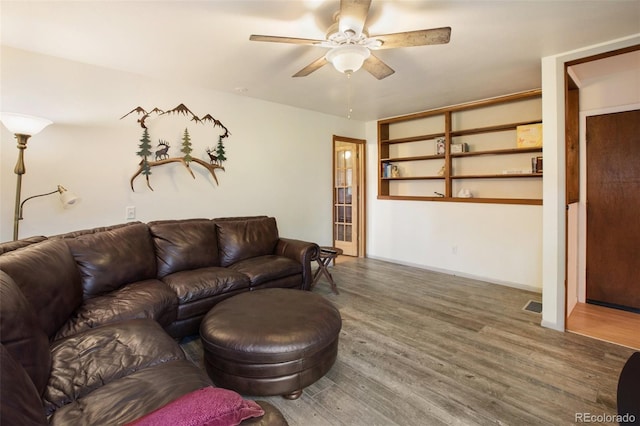 13365 Meadow Glen Ln, Colorado Springs, CO 80908 - living room featuring ceiling fan and wood finished floors