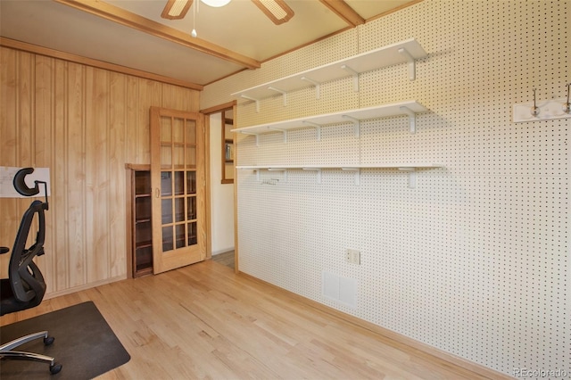 13365 Meadow Glen Ln, Colorado Springs, CO 80908 - unfurnished office featuring light wood finished floors, wood walls, and ceiling fan