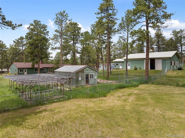 13365 Meadow Glen Ln, Colorado Springs, CO 80908 - view of yard featuring an outdoor structure and an outbuilding
