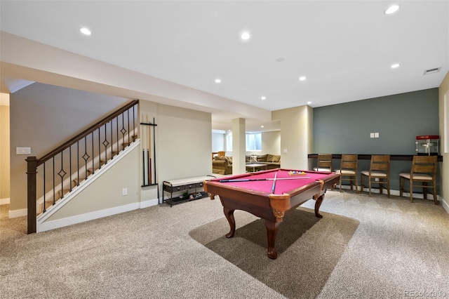 rec room featuring carpet, indoor bar, and pool table