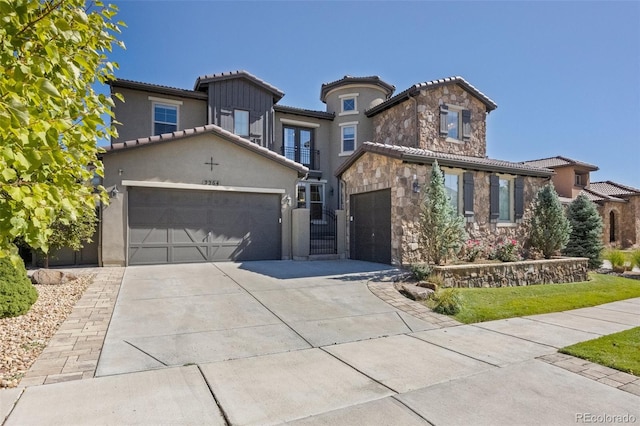 view of front of property featuring a garage