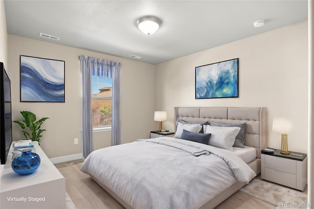 bedroom featuring light hardwood / wood-style flooring