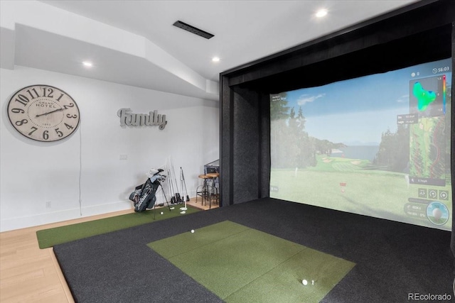 15116 Lyons Ridge Dr, Morrison, CO 80465 - rec room with golf simulator, recessed lighting, wood finished floors, and visible vents
