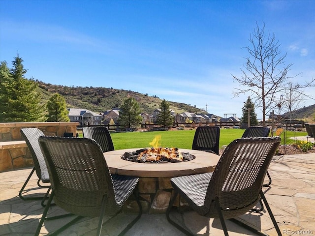 15116 Lyons Ridge Dr, Morrison, CO 80465 - view of patio featuring a mountain view and an outdoor fire pit