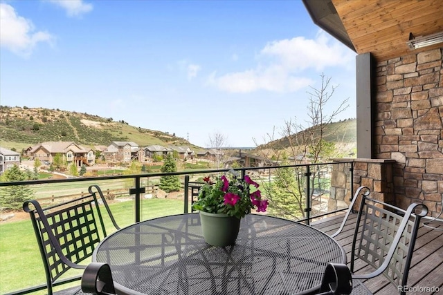 15116 Lyons Ridge Dr, Morrison, CO 80465 - balcony featuring a residential view, a mountain view, and outdoor dining space