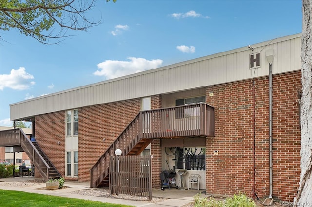 3663 S Sheridan Blvd Unit H15, Denver, CO 80235 - view of property with stairway