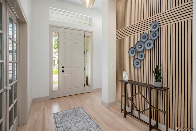 7410 Winter Berry Ln, Castle Pines, CO 80108 - entryway featuring wood finished floors and baseboards