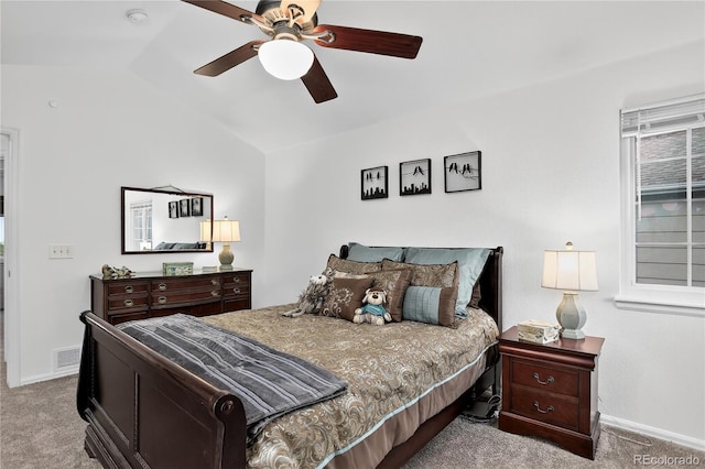 5337 S Ukraine Way, Aurora, CO 80015 - bedroom featuring vaulted ceiling, carpet flooring, and a ceiling fan