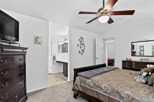 5337 S Ukraine Way, Aurora, CO 80015 - bedroom featuring carpet floors, tile patterned flooring, lofted ceiling, a ceiling fan, and connected bathroom