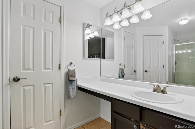 5337 S Ukraine Way, Aurora, CO 80015 - bathroom with a stall shower, vanity, and tile patterned flooring