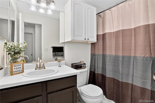 5337 S Ukraine Way, Aurora, CO 80015 - full bathroom featuring vanity and toilet
